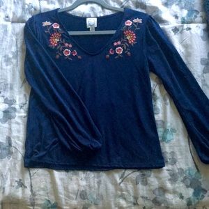 Dark blue blouse with colorful embroidery neckline